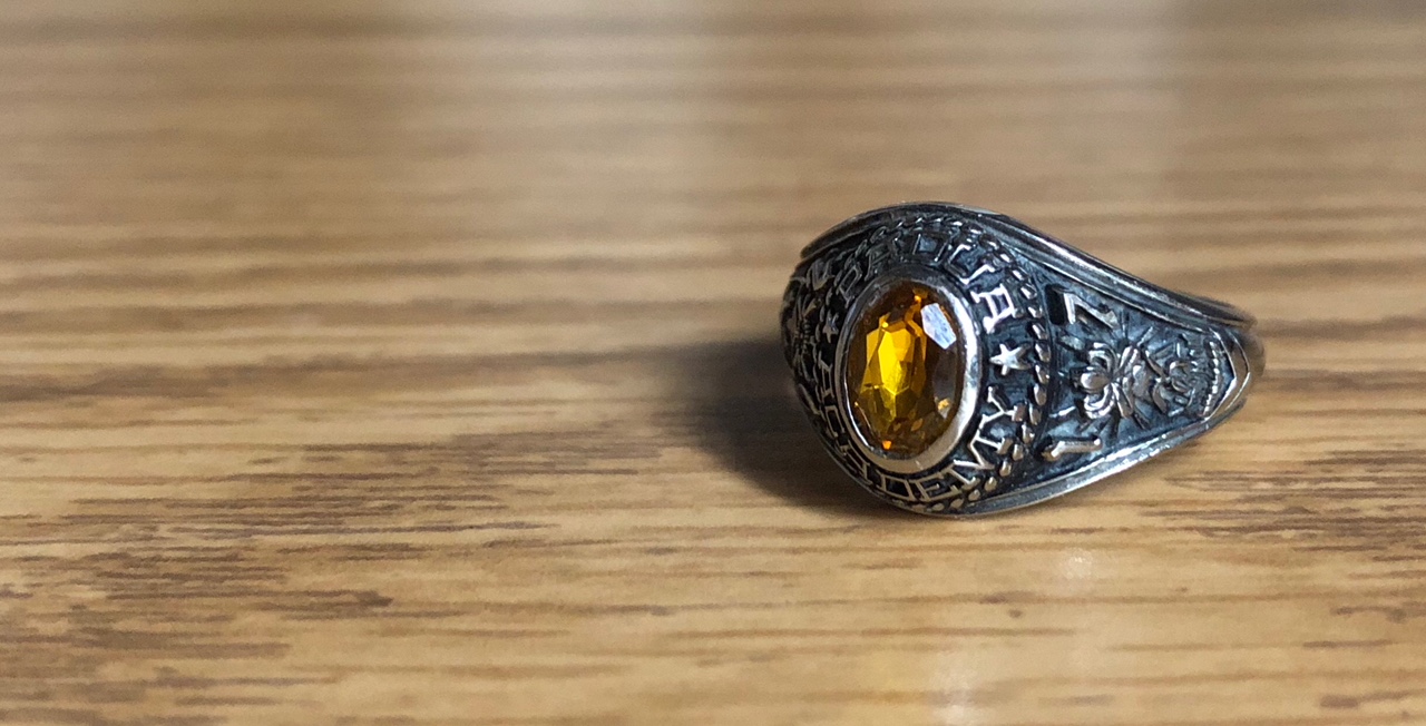 This picture shows Padua Academy's Class of 2017 Ring from Jostens. If you look at the picture from a zoomed in angle, the numbers 1 and 7 are represented on the right next to the emblem for the graduating year.