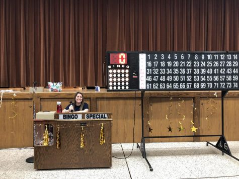 Mrs. Pugliese running the bingo at Blue Gold Bingo Night.