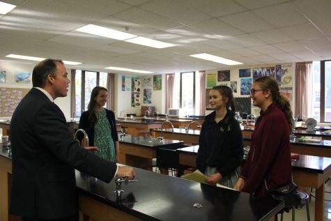 Mr. Lawlor and sophomore, Kaila Timko talk about Biology with visitor 