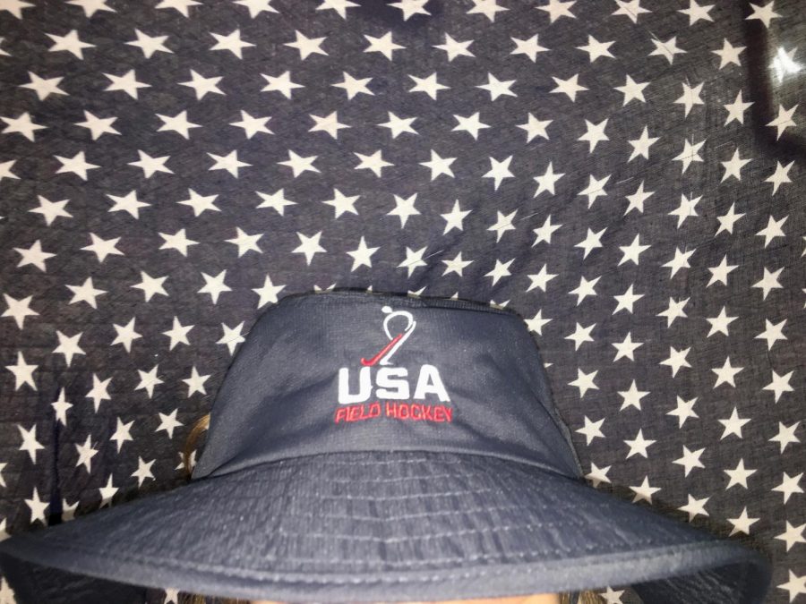 Freshman Erin Callaghan rocks her USA bucket hat on national appreciation day at Padua academy to show her spirit. The blue hat with a blue and white background create a aesthetic photo to admire.