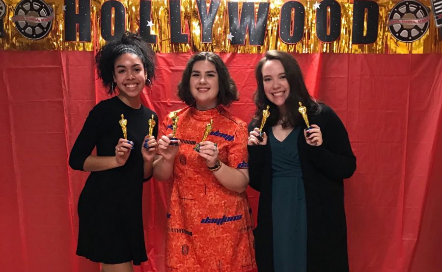 Photo of AP French students Jasmine MacFarlane, Tori Millsap, and Julianna Cann with their Frenchies from the Film Fest on Thursday night.