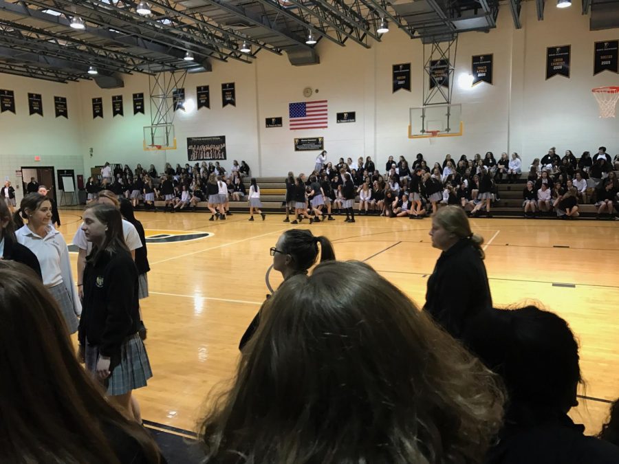 Students file into the gym.