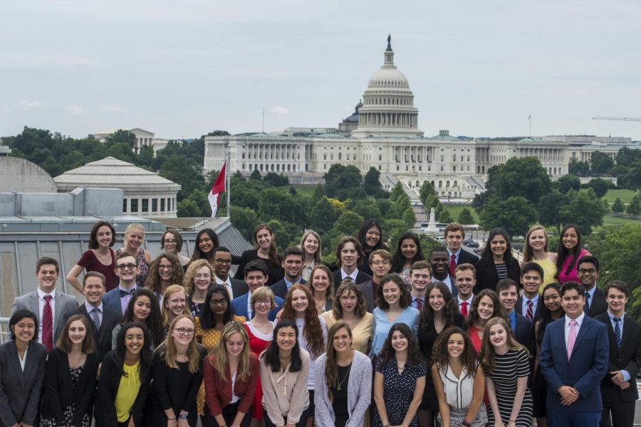 The group poses for a photo together.