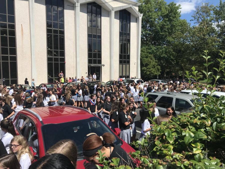 Students gathered in the parking lot for the sparkle party.