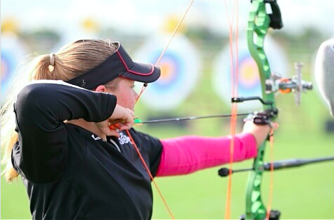Katie Collier, sophomore, shoots an arrow during a tournament. 