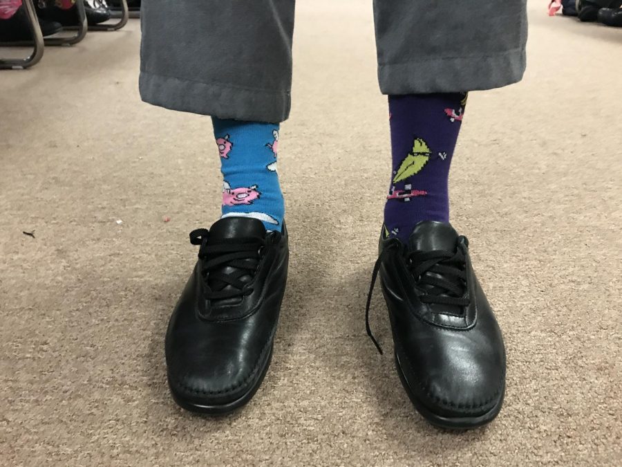 "It's important to wear these crazy socks today in order to raise awareness for down syndrome." - Katie Dorsey