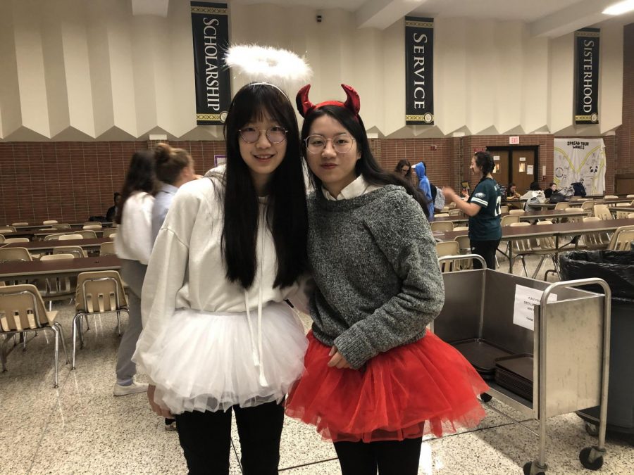 Seniors Crystal Zheng and Elizabeth Lin dressed up as an angel and devil. Angels and devils have always been popular options for costumes.
