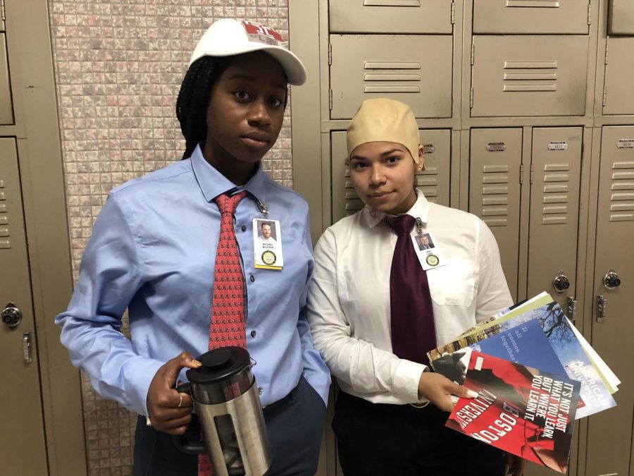 Juniors Krissy Kanu and Tatiana Mendez dressed up as Mr. McAteer and Mr. Lang for Halloween. They were later able to take a picture with the two teachers.