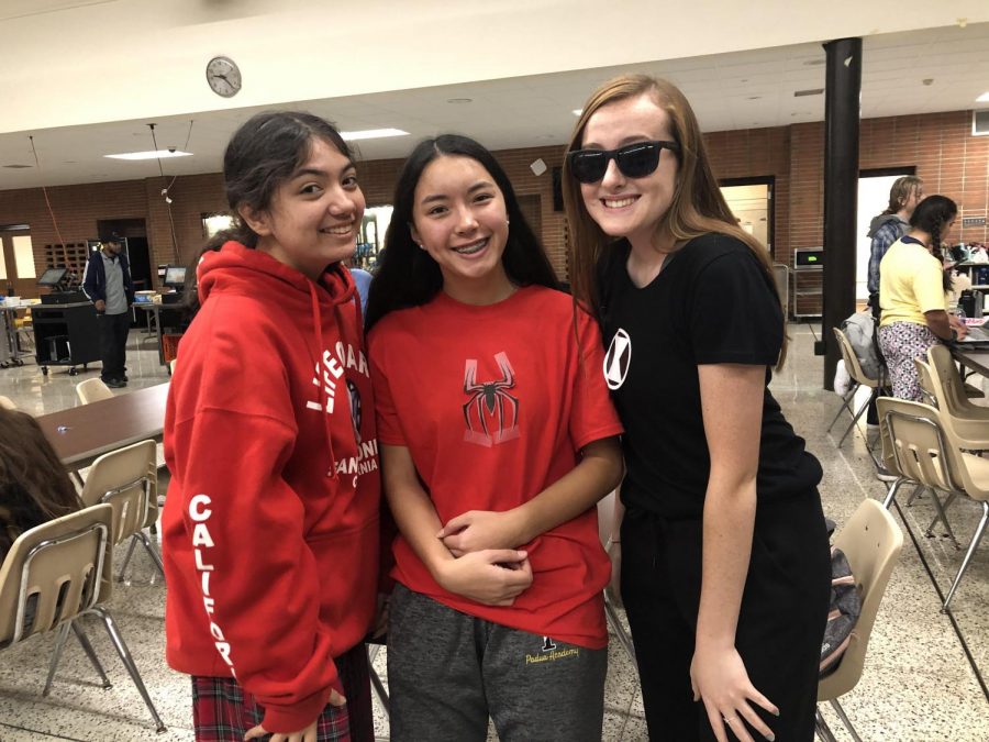 Sophomores Erin Fitzgerald, Jenna Haughton, and Alexis Rabinovitch. Fitzgerald is a lifeguard, Haughton is Spiderman, and Rabinovitch is Black Widow.