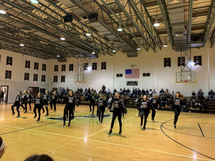 The dance team performing at halftime during a Padua basketball game.