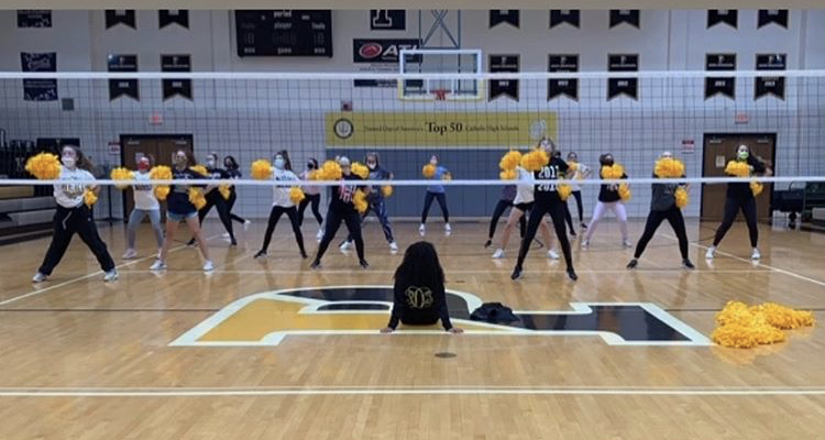 The dance team practices in Paduas Gymnasium on Saturday, October 24th.