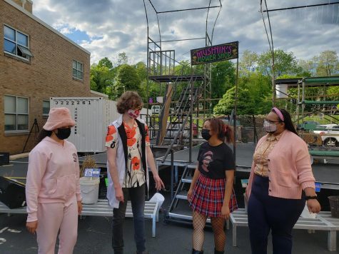 From left, Padua freshman Lauren Perry, Salesianum senior Carmen Rafalli, and Ursuline seniors Amina Hsi and Briarra Barnes rehearse a scene before opening night. They performed outside and masked to follow pandemic restrictions.