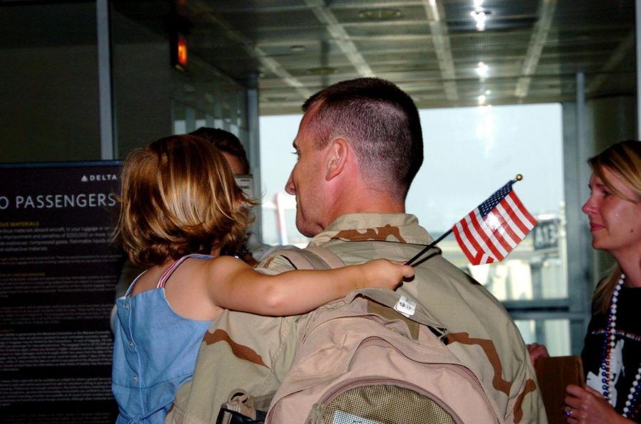 Mr. Patrick Finney, Shannon Finneys father, arrives home from his 2008 deployment with the Navy. He was greeted by his family.