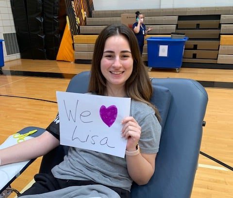 Kayla Jaco '23 poses as she gets her blood drawn. Jaco was one of many donors who helped donate to the Delmarva Blood Bank.