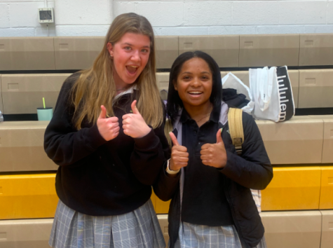 Lilly Tourge 23 and Journey Davis 24 pose for a photo. The students said they are ready for the spring season.